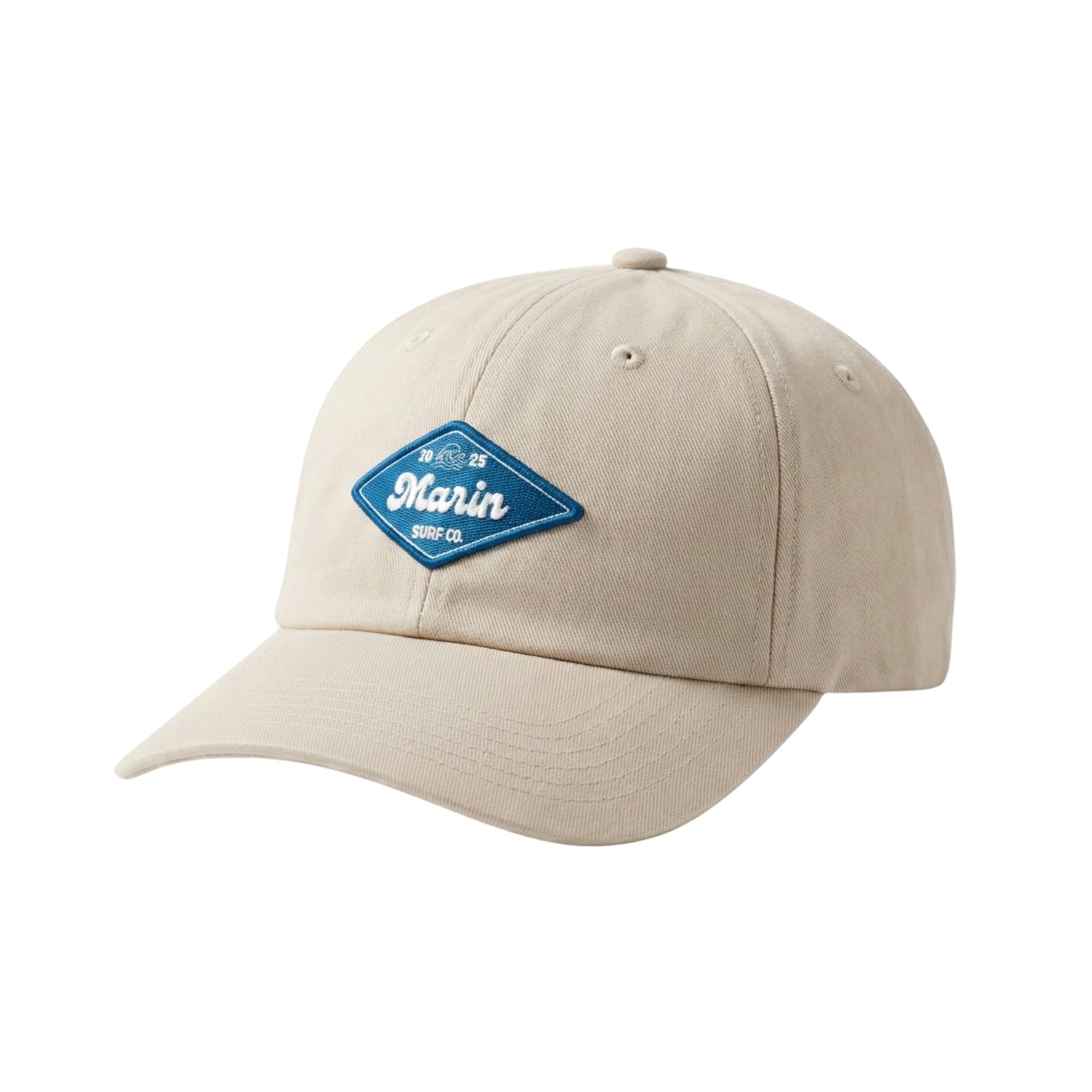 Beige surf hat with blue embroidered patch, curved brim, ocean lifestyle design